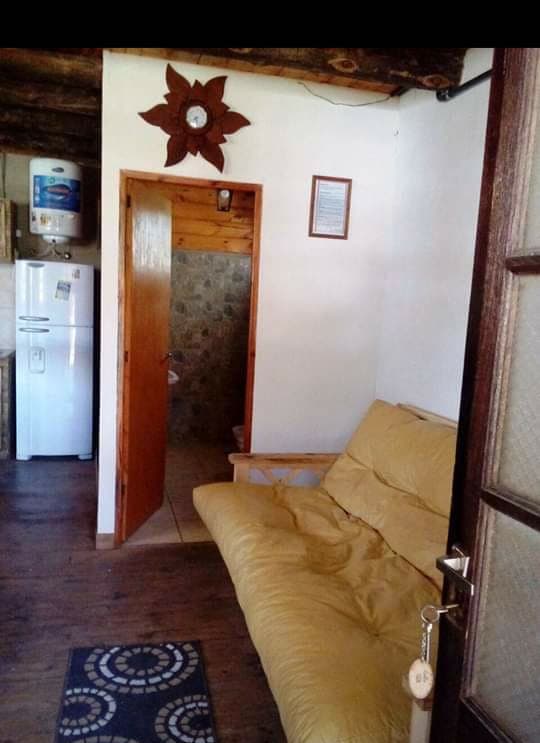 Living de una cabaña